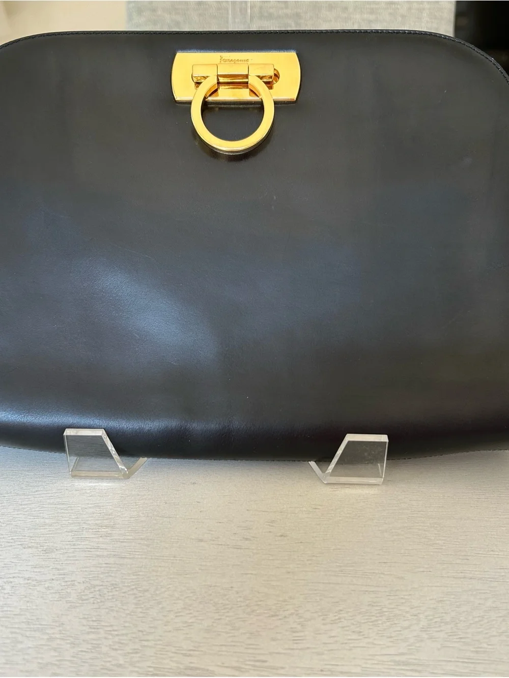 Salvatore Ferragamo Black Leather Clutch with Gold Ring Detail